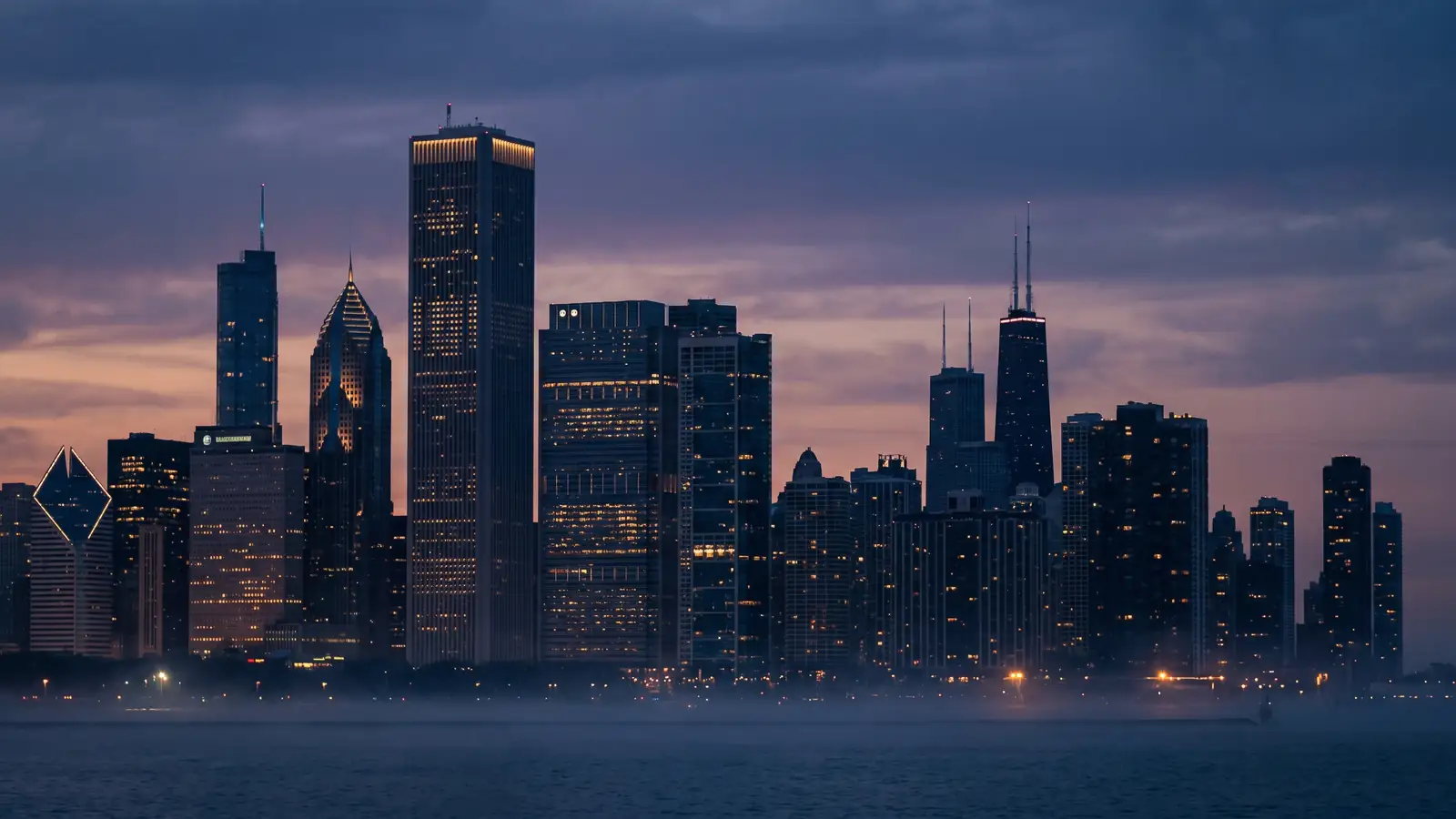 The Chicago skyline at dusk seen from across the lake.